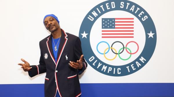 Snoop Dogg will be hoping he doesn't drop the Olympic torch like it's hot