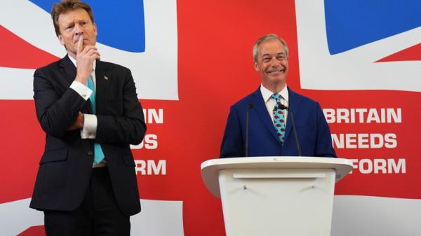Nigel Farage (right) and Richard Tice announce their party's eco<em></em>nomic policy during a press co<em></em>nference at Church House.</p>

<p>　　Pic: PA
