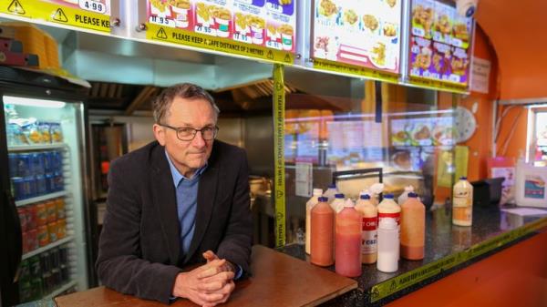 Mosley pictured at fast food restaurant as part of promo for a Channel 4 series. Pic: PA
