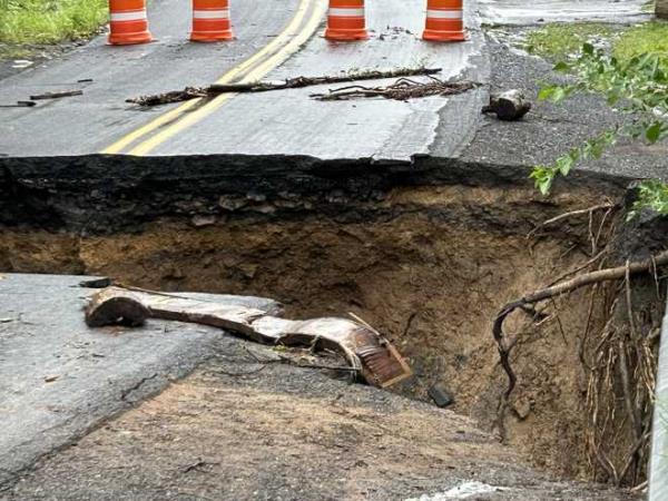 A vehicle tumbled into a sinkhole that opened on a road in Juniata County after severe storms caused flash flooding Thursday night into early Friday morning in parts of central and south-central Pennsylvania.