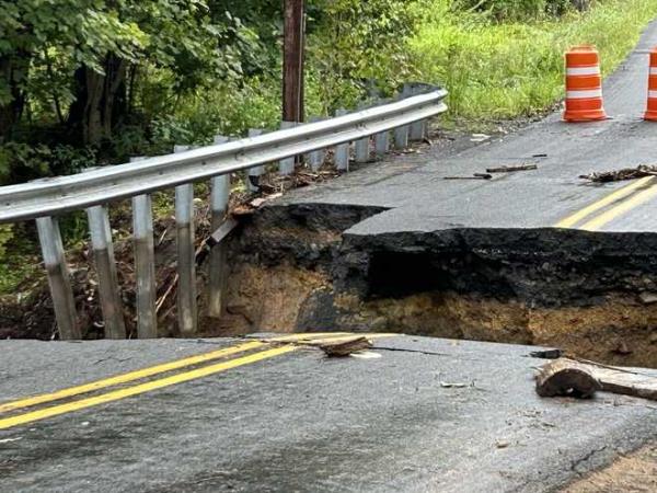 A vehicle tumbled into a sinkhole that opened on a road in Juniata County after severe storms caused flash flooding Thursday night into early Friday morning in parts of central and south-central Pennsylvania.