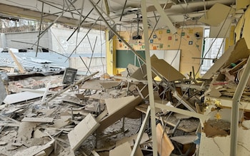 A school in Kharkiv lies in ruins on Sunday after a Russian attack