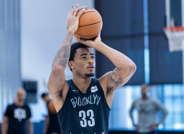 Nic Claxton puts up a shot during Nets practice.