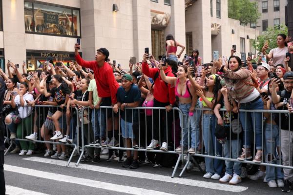 Fans lined the streets behind police barriers.