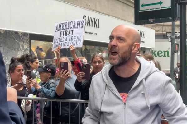 The New York pols were drowned out by the angry screams outside the Roosevelt Hotel mega shelter in Midtown Friday morning.