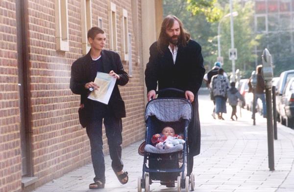  O’Co<em></em>nnor embarked on a relatio<em></em>nship with Irish journalist John Waters, with whom she welcomed daughter, Roisin, in 1996. They are pictured together before their acrimo<em></em>nious split. 