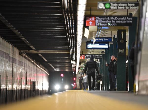 View looking down a subway platform.
