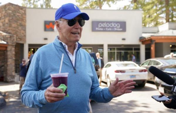 President Joe Biden speaks to reporters after taking a Pilates and spin class in South Lake Tahoe, California, on Friday 