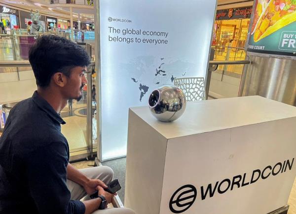 Kaleem, 22, an engineer in Bengaluru, signs up for WorldCoin by havin<em></em>g his eyes scanned.