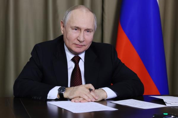 Russian President Vladimir Putin takes part in a ceremony marking the delivery of Russian nuclear fuel to the first power unit of the Rooppur NPP in Bangladesh, via videoco<em></em>nference call, in Sochi, Russia, Thursday, Oct. 5, 2023