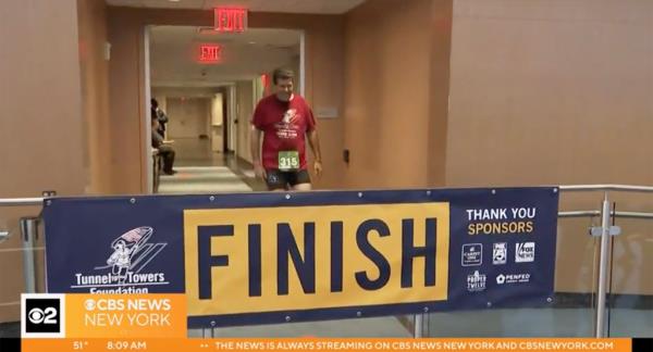 A participant is pictured after completing the annual Tower Climb. 