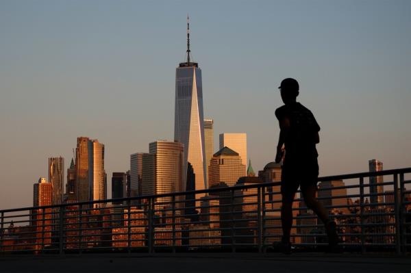 The Freedom Tower is pictured towering above the do<em></em>nwtown Manhattan skyline.