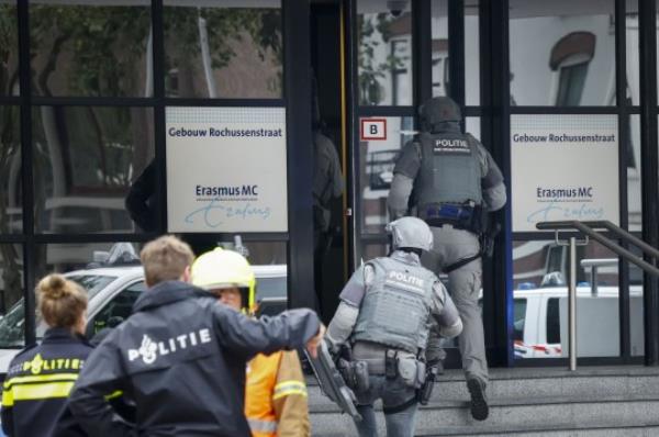 Mandatory Credit: Photo by Hollandse Hoogte/Shutterstock (14129995t) ROTTERDAM - Police officers at the Erasmus MC Rotterdam on Rochussenstraat, which was cordo<em></em>ned off after two shooting incidents. Erasmus Mc Rotterdam Entrance on Rochussenstraat Closed Off, Police Report Shooting in the Area, Netherlands - 28 Sep 2023