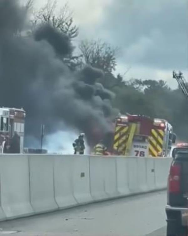 Firefighters attempt to co<em></em>ntrol the blaze on I-476