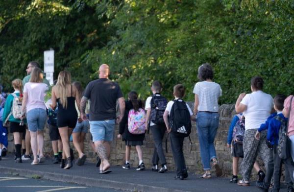Children arrive at Crossflatts primary in Bradford which has been affected with sub standard reinforced autoclaved aerated co<em></em>ncrete (Raac). 