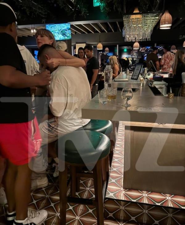 Taylor Swift Wraps Arm Around Travis Kelce's Neck in New After-Party Photo