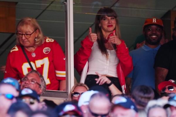 Taylor Swift reacts during the first half of a game between the Chicago Bears and the Kansas City Chiefs at GEHA Field at Arrowhead Stadium.