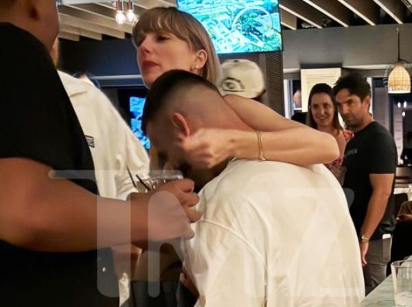 Taylor Swift Wraps Arm Around Travis Kelce's Neck in New After-Party Photo