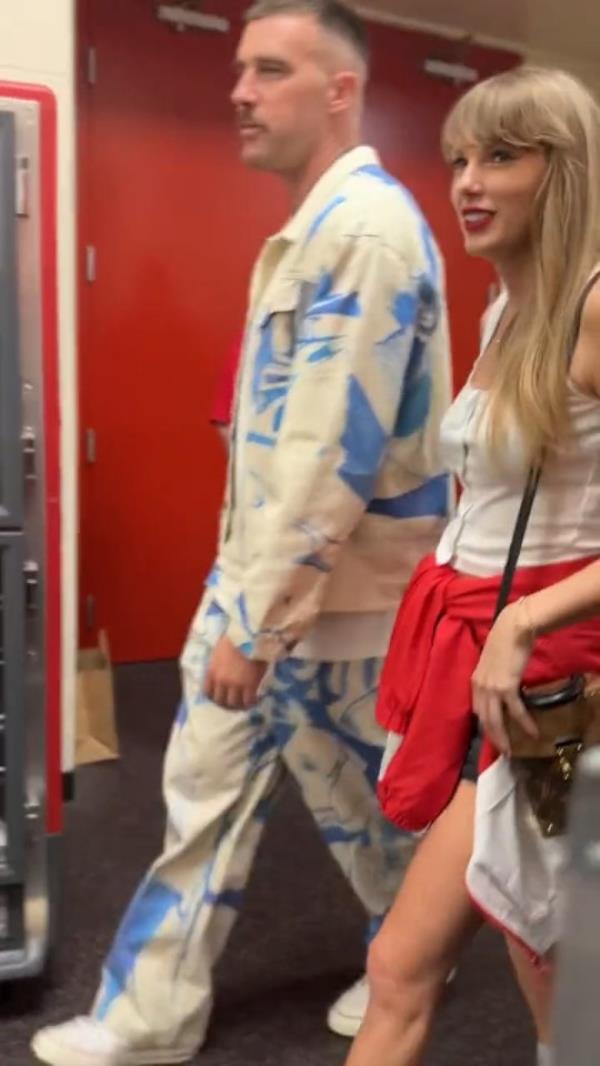 Taylor Swift and Travis Kelce leaving Arrowhead together after a game. 