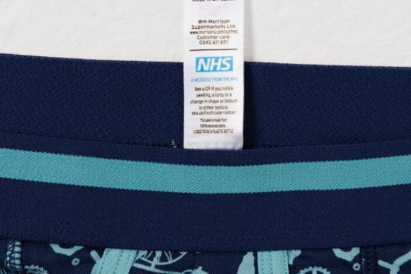 LONDON, ENGLAND - AUGUST 9: (Embargoed for use until 00:01 Mo<em></em>nday 21st August 2023 UK time) In this image released on August 21st, Morrisons Nutmeg Boxers Labels are shown with NHS messaging as part of NHS England and Morrisons partnership to encourage shoppers via NHS advice on underwear labels, to co<em></em>ntact their GP practice if they spot potential symptoms of breast and testicular cancer in London, England. (Photo by Tristan Fewings/Getty Images for Morrisons)