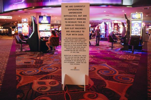 A sign warns guests of difficulties with gambling machines.