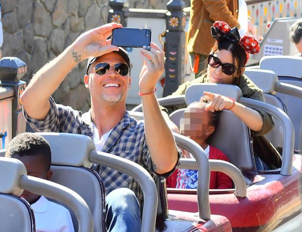 EXCLUSIVE: Sandra Bullock and her boyfriend Bryan Randall are joined by Jason Bateman and his family while spending the day at Disneyland. Sandra and her boyfriend along with Jason and his wife and kids had a blast riding many of the parks attractions, taking selfies, eating churros and playing with light sabers everyone seemed to have had a pretty great day. 
