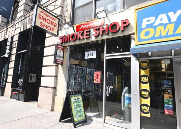 Smoke shops stand in the East Village on June 16 as authorities step up a crackdown on unlicensed smoke shops selling cannabis.