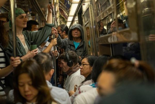 Passengers ride the subway during the morning rush hour June 27, 2023 in New York City.