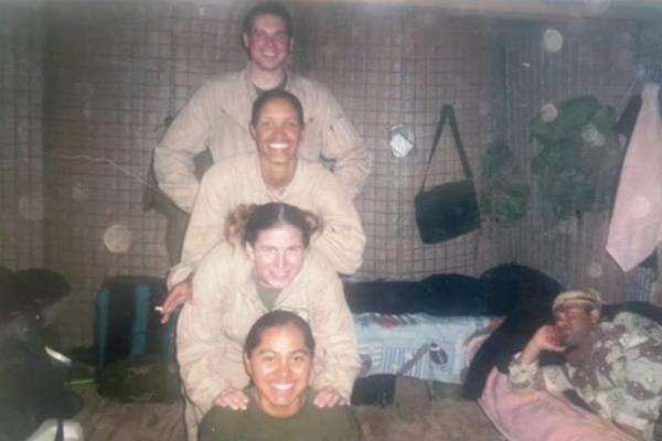 Amy Folwell, 37, from Rochester, New York, and her fellow Lio<em></em>ness soldiers posing for a picture while overseas. 