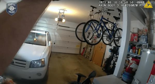 During the search, officers heard banging coming inside the home and found the 40-year-old man sitting in the front seat of the car with a red gasoline can and hammer in his lap.
