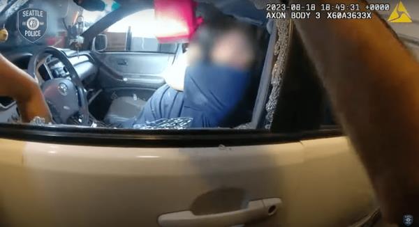Police broke the driver-side window and the suspect took it as a reason to take another swig of gasoline.