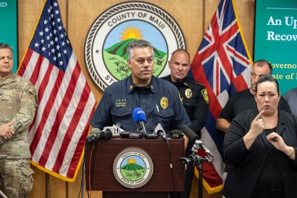 Officials are seen at news co<em></em>nference revealing just two victims of wildfires have been IDed.</p>

<p>　　.