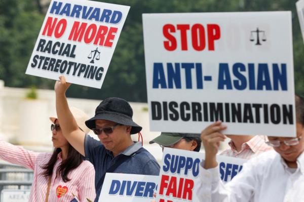 Asian-American protestors calling affirmative action discriminatory outside of the Supreme Court.