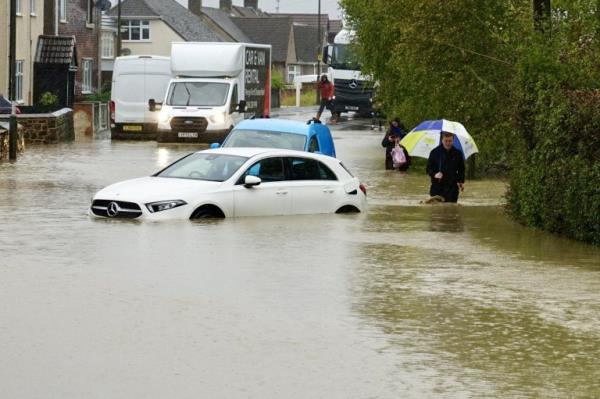 The scene in Chesterfield wher<em></em>e Storm Babet caused flooding or roads and houses, October 20 2023. See SWNS story SWNAstorm