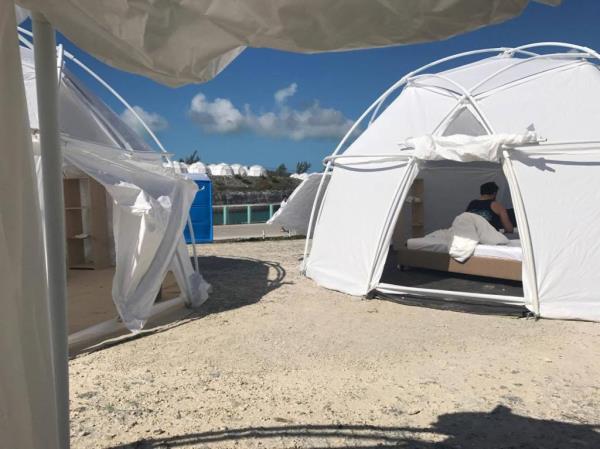 General Views from the Disastrous Fyre Festival in Bahamas is a major Fail and canceled as guests who paid ￡10,000 for a trashy unfinished site and canceled performances. This was a far cry from coachella,as people arrived to findto their dissapointment half-built tents, rat dro<em></em>ppings, stray dogs wandering around the festival site. Scenic mountains of trash also was included. To make matters worse many people were also stranded Exuma Internatio<em></em>nal Airport after opting to return home havin<em></em>g seen the incomplete trashy festival site.</p>

<p>　　