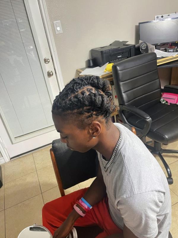 Darryl George's mother values her son keeping his dreads, saying his ancestors are 