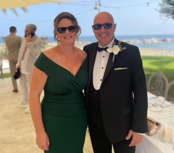 A Glasgow family were thrown into utter chaos after their dream Spanish wedding was nearly scrapped when their luggage never arrived at Ibiza Airport. Newlyweds, Claire and Wesley Hampson, endured nothing but stress in the lead up to their special day after flying out 62 guests to Ibiza to watch them tie the knot on their favourite island. Caption - ather of the groom Mark, and his partner Arlene Grant