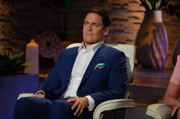 Mark Cuban sitting on Shark Tank.