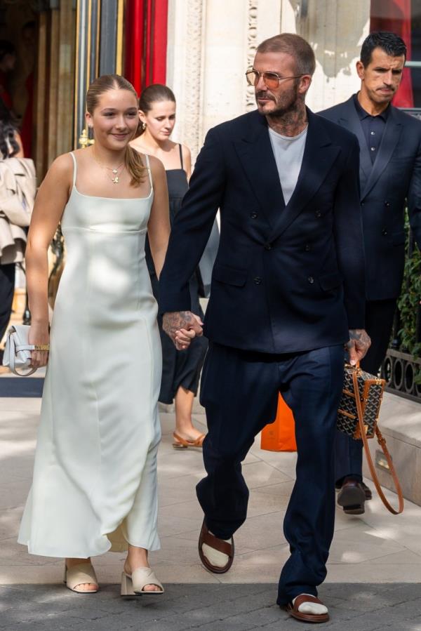 PARIS, FRANCE - SEPTEMBER 29: (L-R) Harper Beckham and David Beckham are seen on September 29, 2023 in Paris, France. (Photo by Marc Piasecki/GC Images)