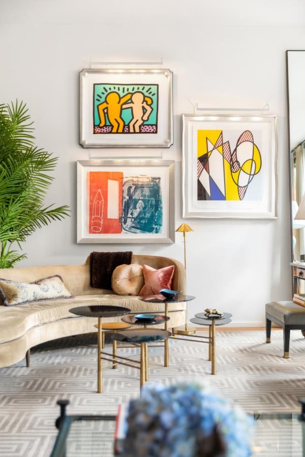 Interior of a sitting room adorned with art. 