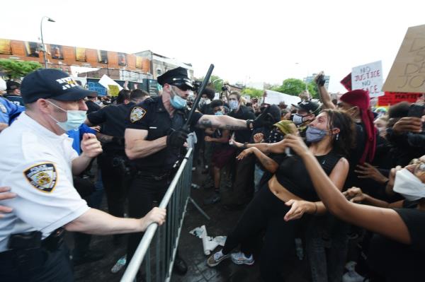 police face off against protestors