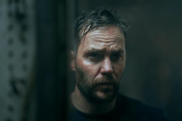 Taylor Kitsch looking rough. 