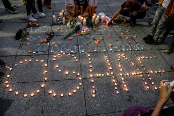 People create a makeshift memorial for O'Shea Sibley on August 5, 2023