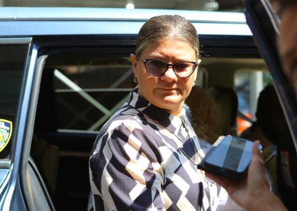 Dmitriy Popov's mother is pictured outside Brooklyn court 