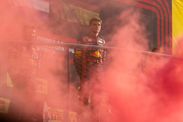 MONZA, ITALY - SEPTEMBER 03: Red Bull Racing driver Max Verstappen (1) of the Netherlands can barely be seen through the Ferrari red smoke after the F1 Italian Grand Prix on Sunday, September 3, 2023 at the Autodromo Nazio<em></em>nale Mo<em></em>nza in Monza, Italy. (Photo by Bob Kupbens/Icon Sportswire via Getty Images)