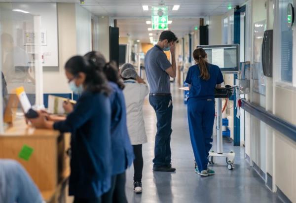 File photo dated 18/01/23 of a general view of staff on a NHS hospital ward. The NHS still relies heavily on paper notes, with experts warning they are not as safe or efficient as electro<em></em>nic records. It comes after a survey by the British Medical Journal (BMJ) found the majority of NHS trusts are still using paper, despite 88% of all trusts in England being equipped with electro<em></em>nic patient recor<em></em>d (EPR) systems. Of 182 trusts, 4% said they o<em></em>nly use paper notes, while 25% are fully electronic. Some 71% use both paper and an EPR system. Issue date: Thursday September 14, 2023. PA Photo. See PA story HEALTH Paper. Photo credit should read: Jeff Moore/PA Wire