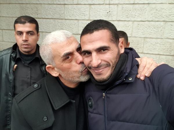 Hassan Eslaiah, an AP/CNN photographer, with Hamas leader Yahya Sinwar in an undated photo.