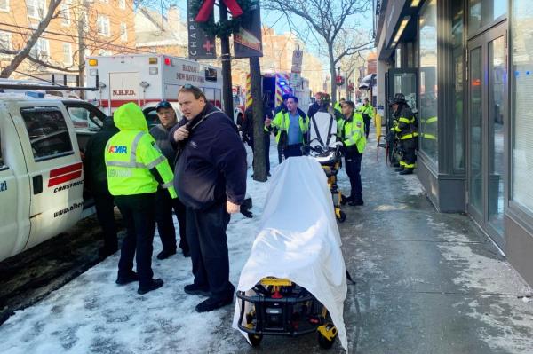 New Haven emergency respo<em></em>nders work outside a building wher<em></em>e 14 people fell ill due to carbon mo<em></em>noxide poiso<em></em>ning on Jan. 17, 2024. 