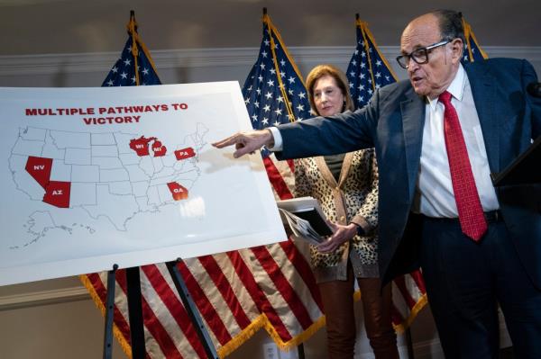 WASHINGTON, DC - NOVEMBER 19: Rudy Giuliani points to a map as he speaks to the press a<em></em>bout various lawsuits related to the 2020 election,  inside the Republican Natio<em></em>nal Committee headquarters on November 19, 2020 in Washington, DC.