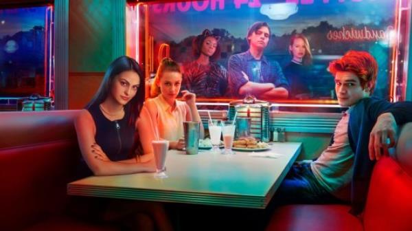 KJ Apa as Archie Andrews, Lili Reinhart as Betty Cooper, and Camila Mendes as Vero<em></em>nica Lodge in Riverdale
